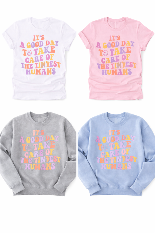 Four shirts in different colors with a printed message on a white background