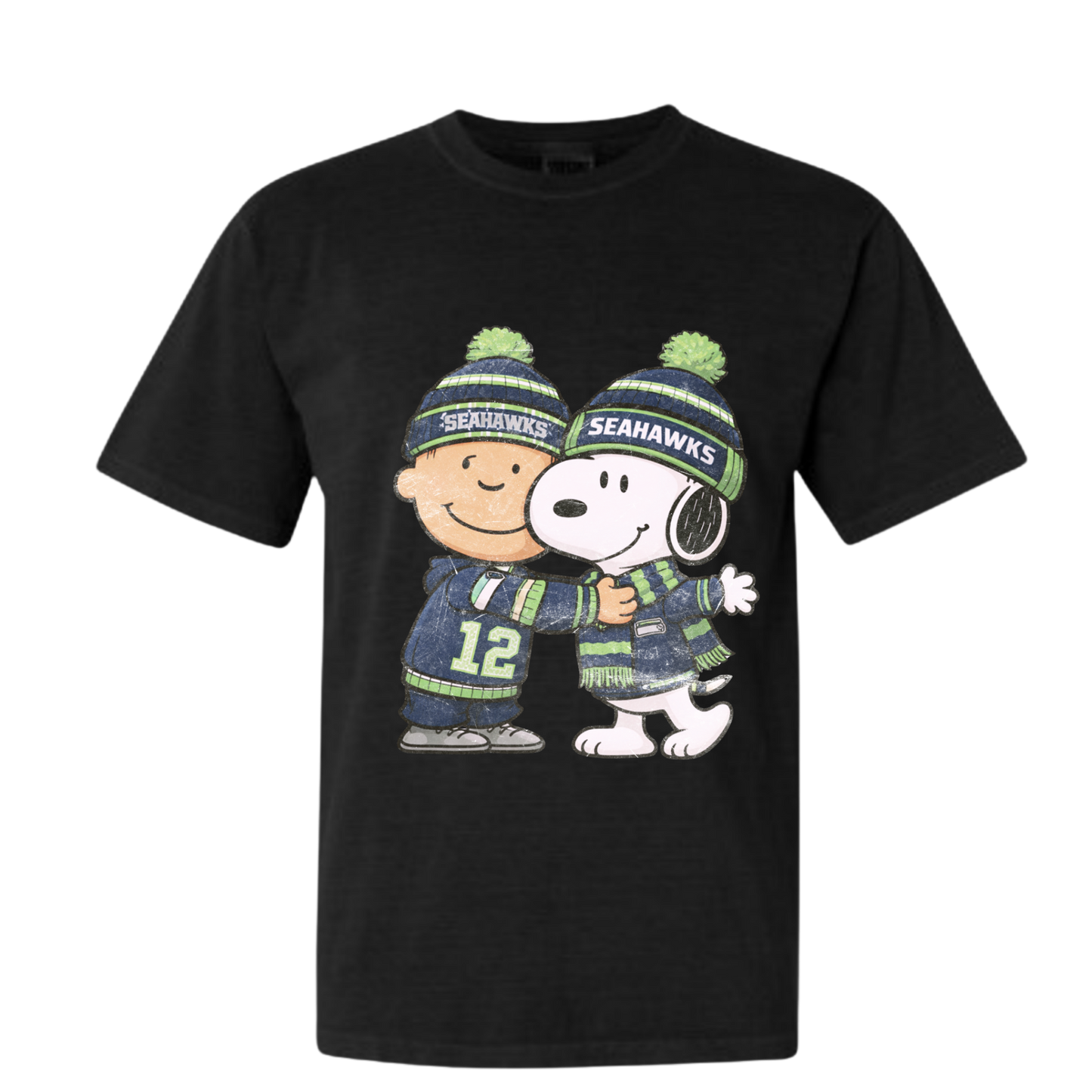 Black t-shirt with a graphic of a Charlie Brown and Snoopy wearing Seahawks hats and jerseys on a black tshirt.
